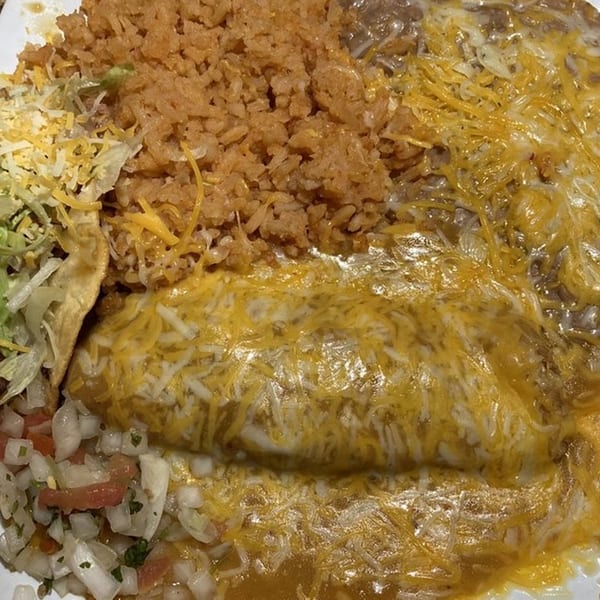 A Burrito Grande platter with a cheese-covered burrito, rice, beans, and pico de gallo.